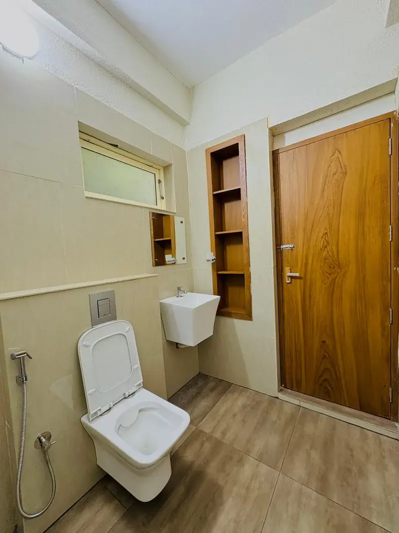Room with timber door and shelf