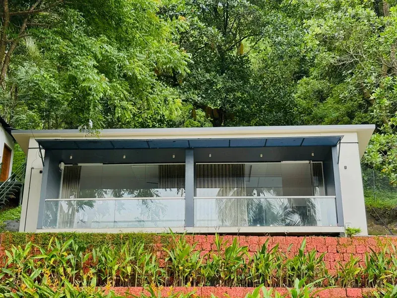 Glass house stay in Vayalada among the greenery