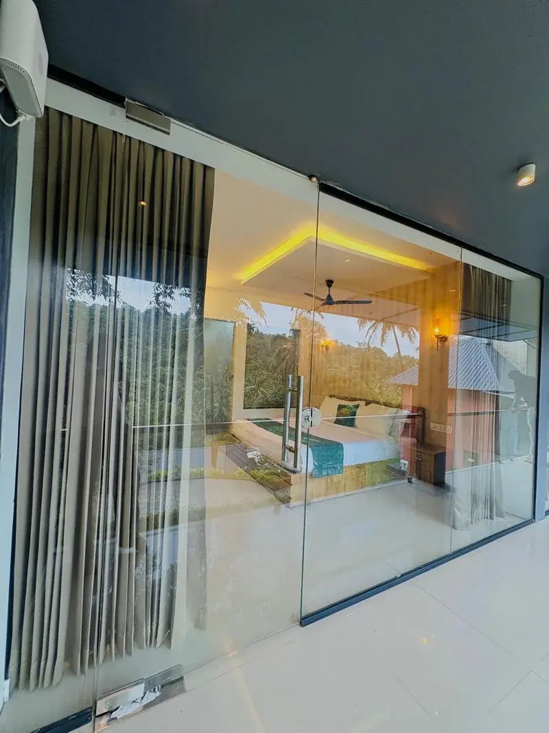 Glass house curtains and ceiling lights