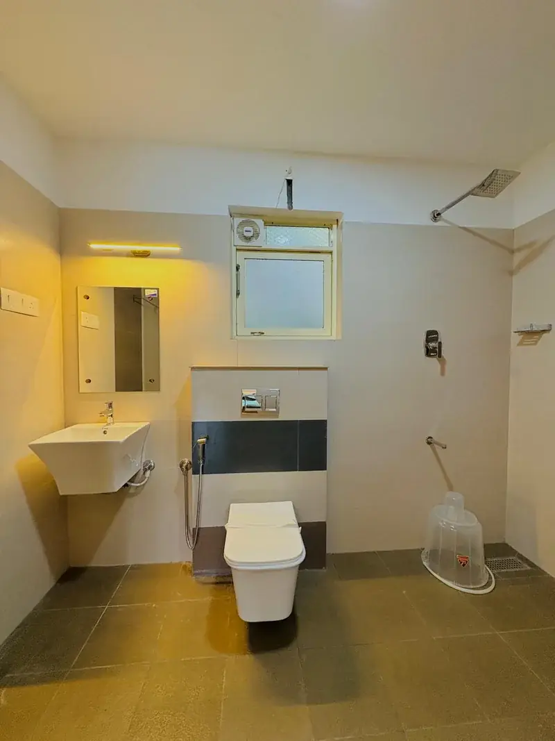 Bathroom vanity and rain shower