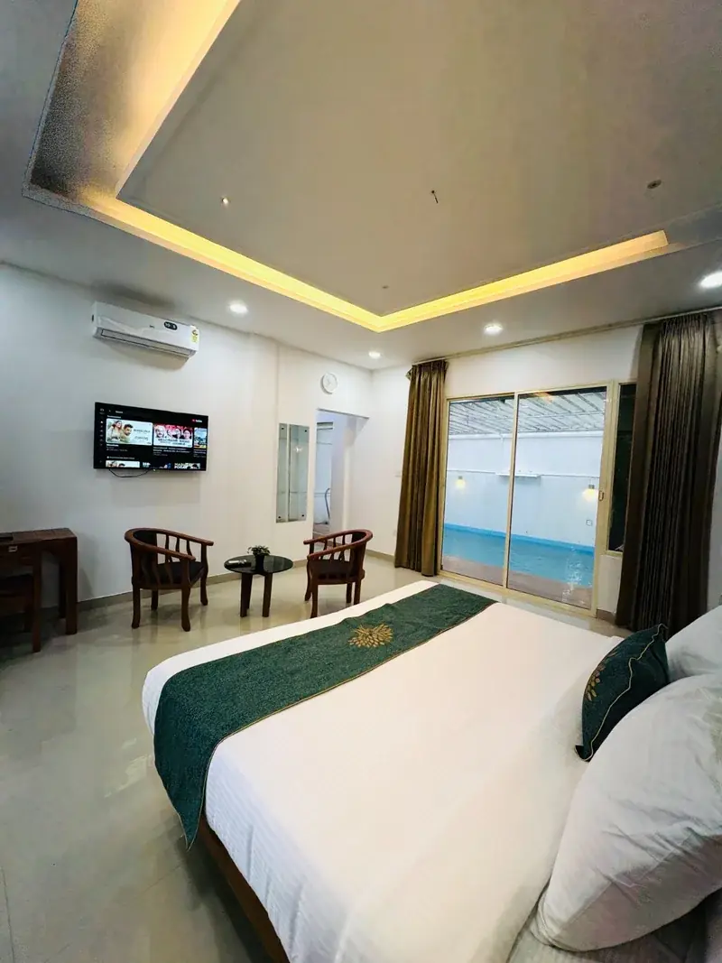 Pool villa room with television and pool access