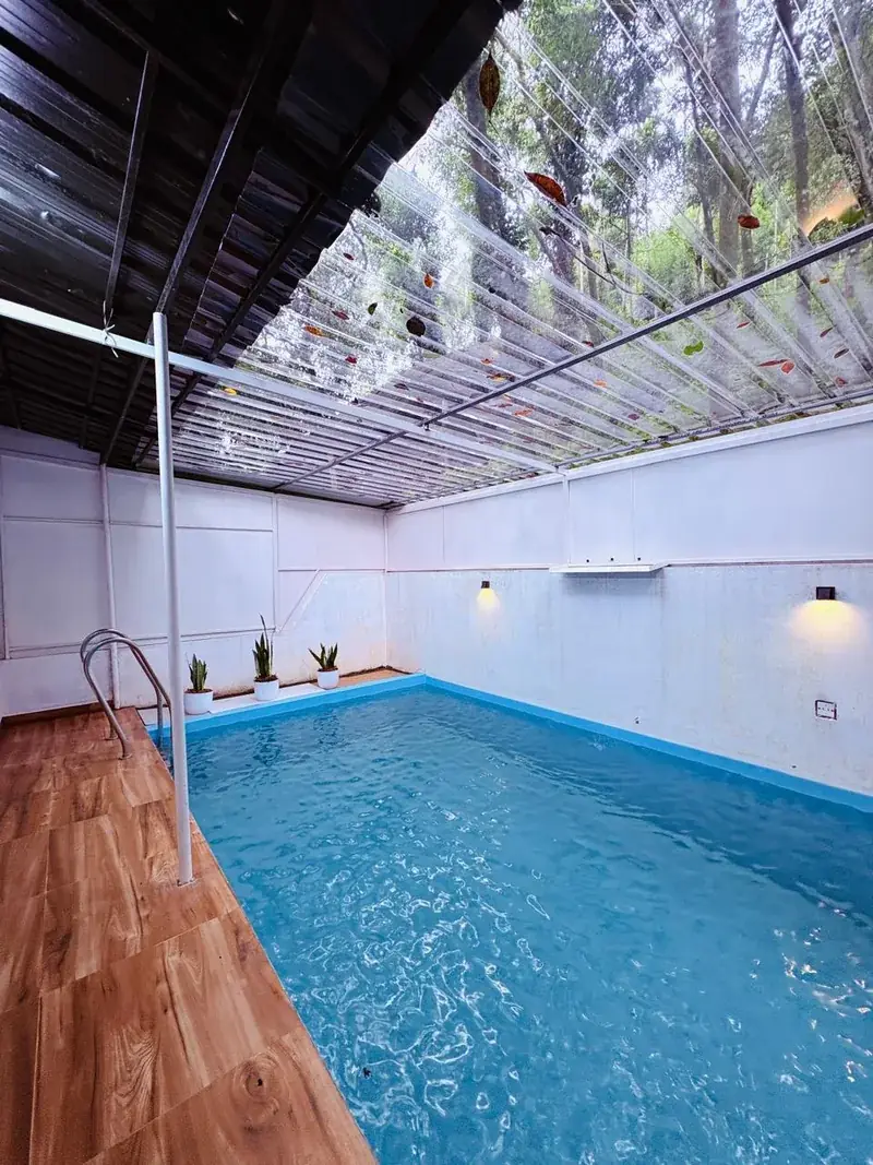 Private pool villa in Vayalada with indoor swimming pool