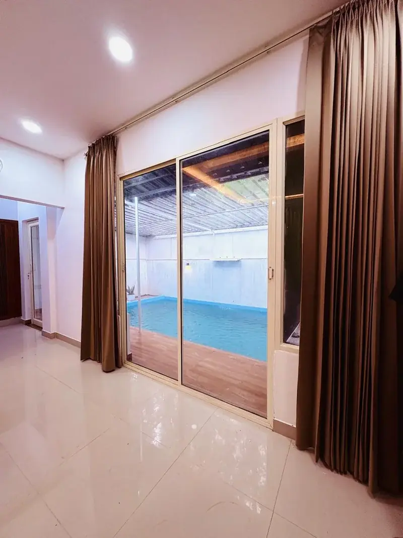 Pool villa sliding glass door to pool